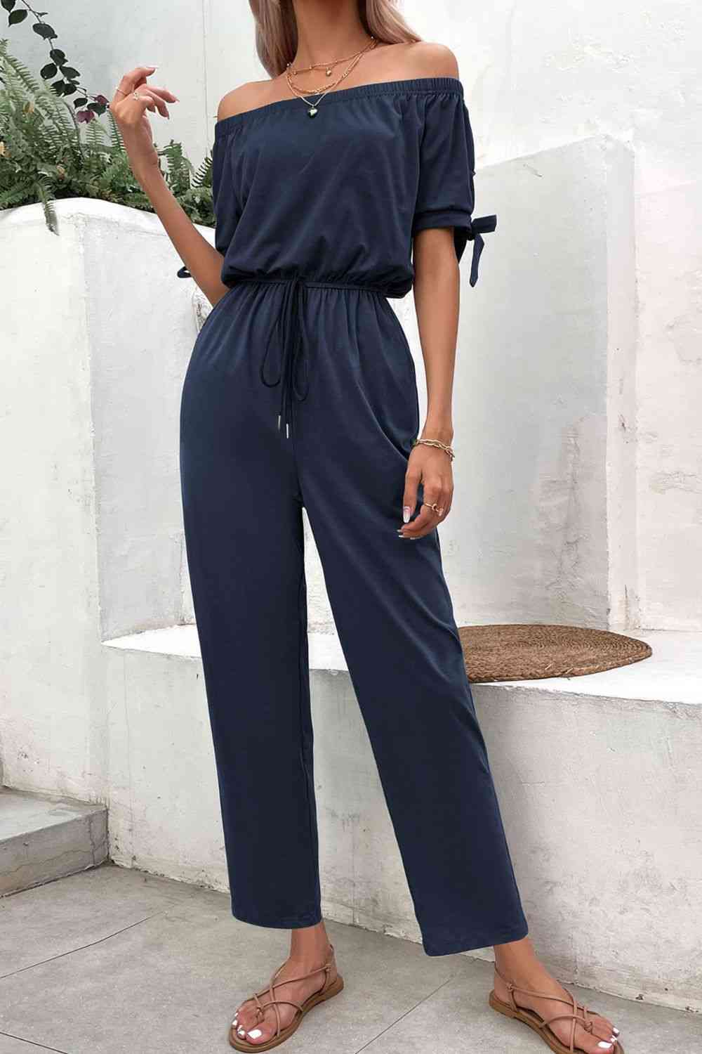 Buy Off-Shoulder Tie Cuff Jumpsuit with Pockets by Hundredth