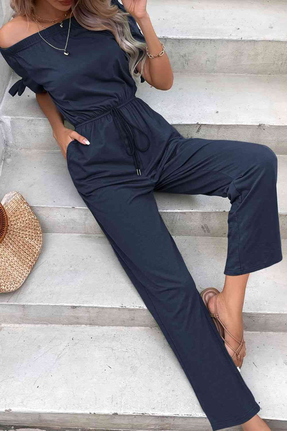 Buy Off-Shoulder Tie Cuff Jumpsuit with Pockets by Hundredth
