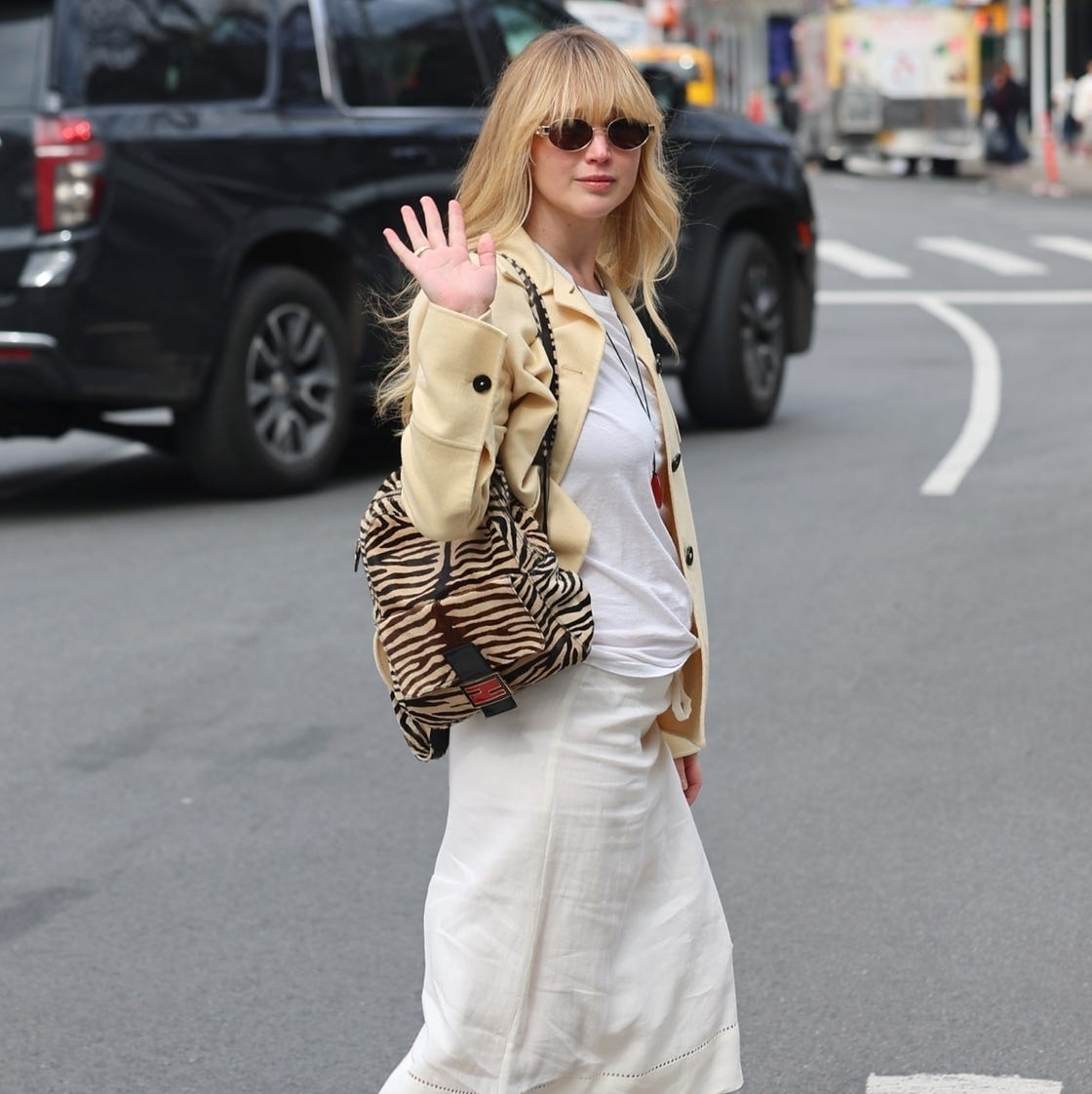 Jennifer Lawrence Embraces the Ballet Sneaker Trend: A Look at Spring 2025's Hottest Footwear Fashion