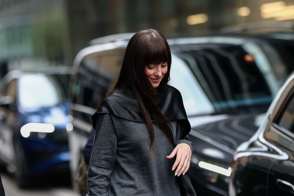 Dakota Johnson Revives the Cape: Fall’s Most Sophisticated Outerwear Trend