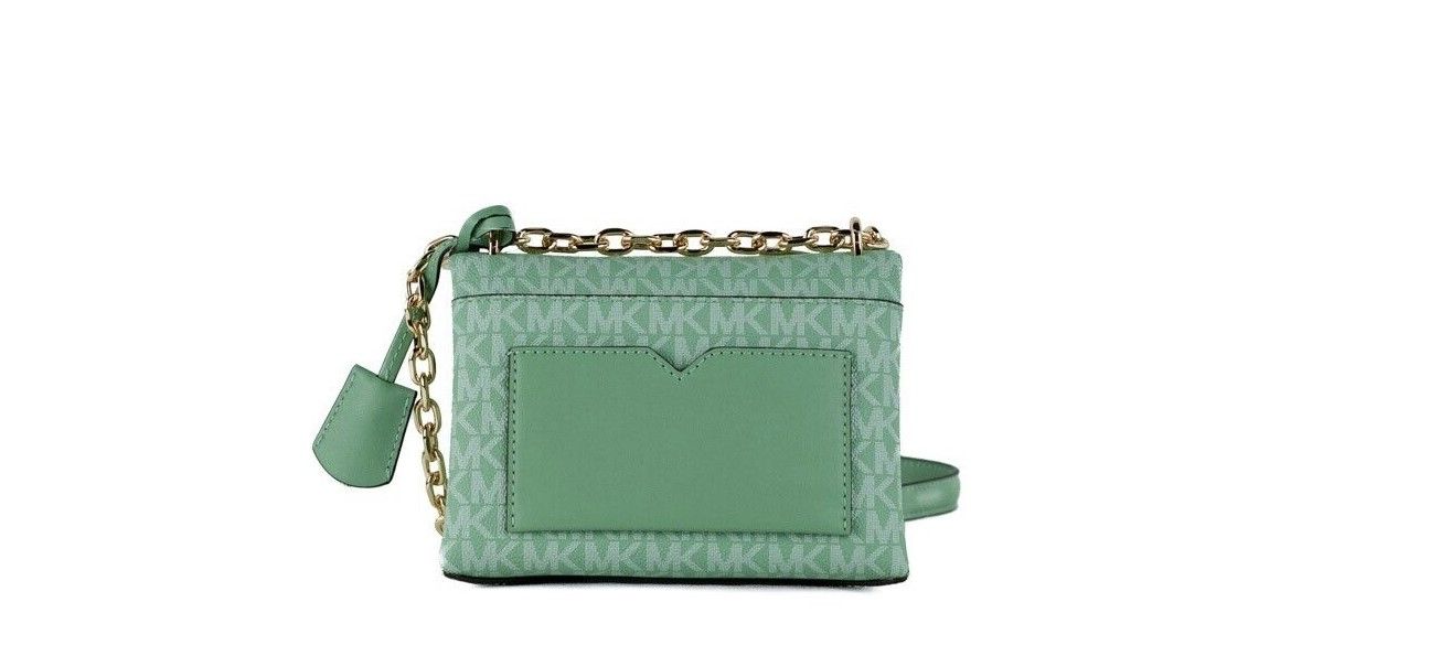 Buy Cece Small Sea Green Signature PVC Convertible Flap Crossbody Bag by Michael Kors