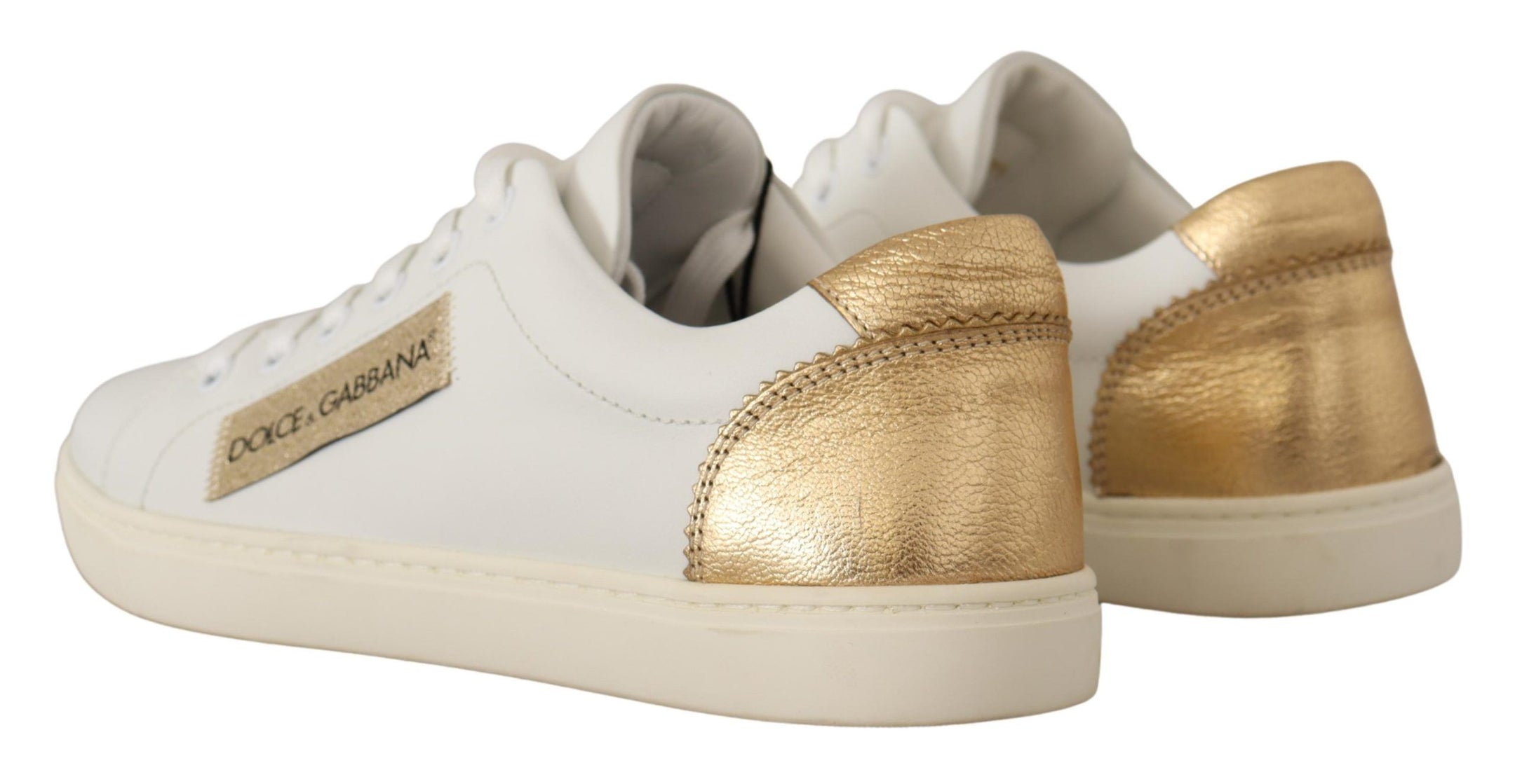 Buy Elegant White Leather Sneakers with Gold Accents by Dolce & Gabbana