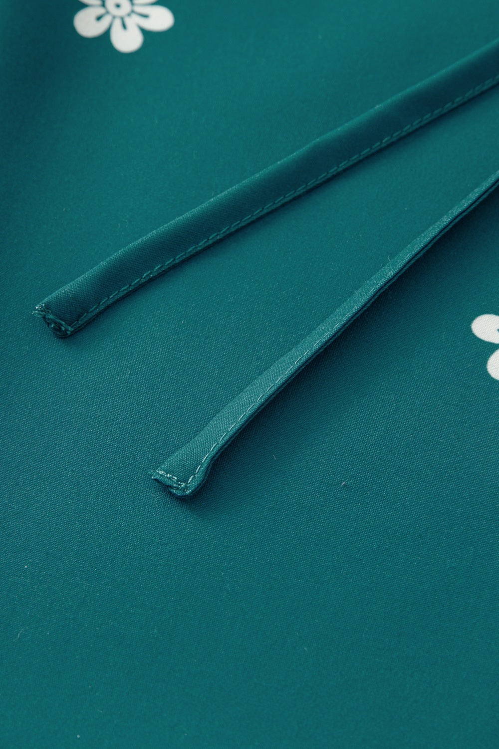 Buy Floral Ruffle Puff Sleeve Tie Neck Mini Dress by Faz