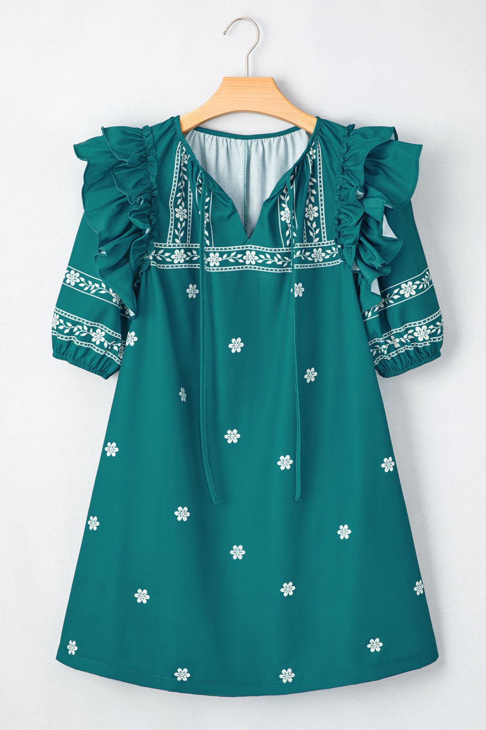 Buy Floral Ruffle Puff Sleeve Tie Neck Mini Dress by Faz