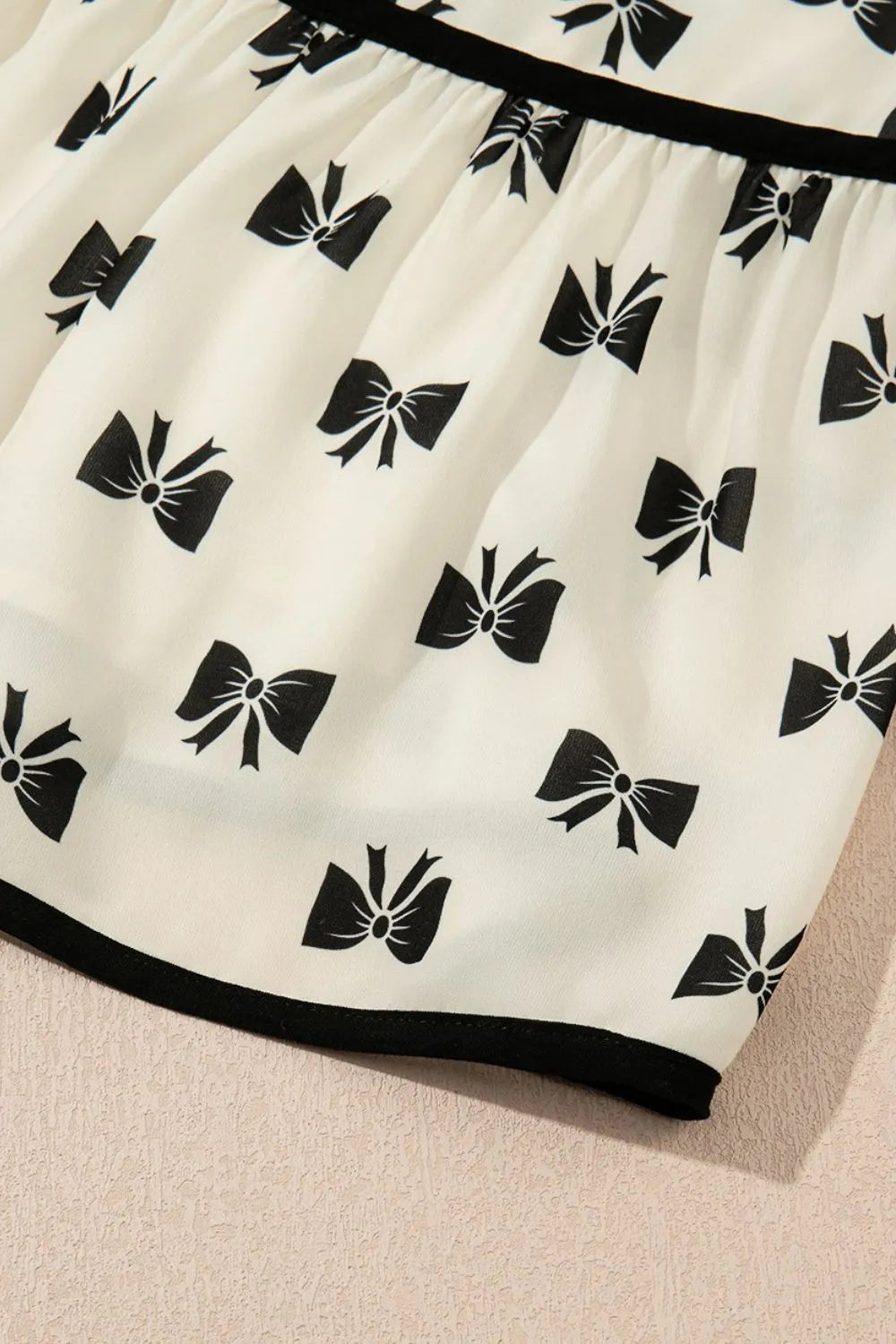 Buy Bow Knot Color Contrast Trim Knotted Shoulder Mini Dress by Faz