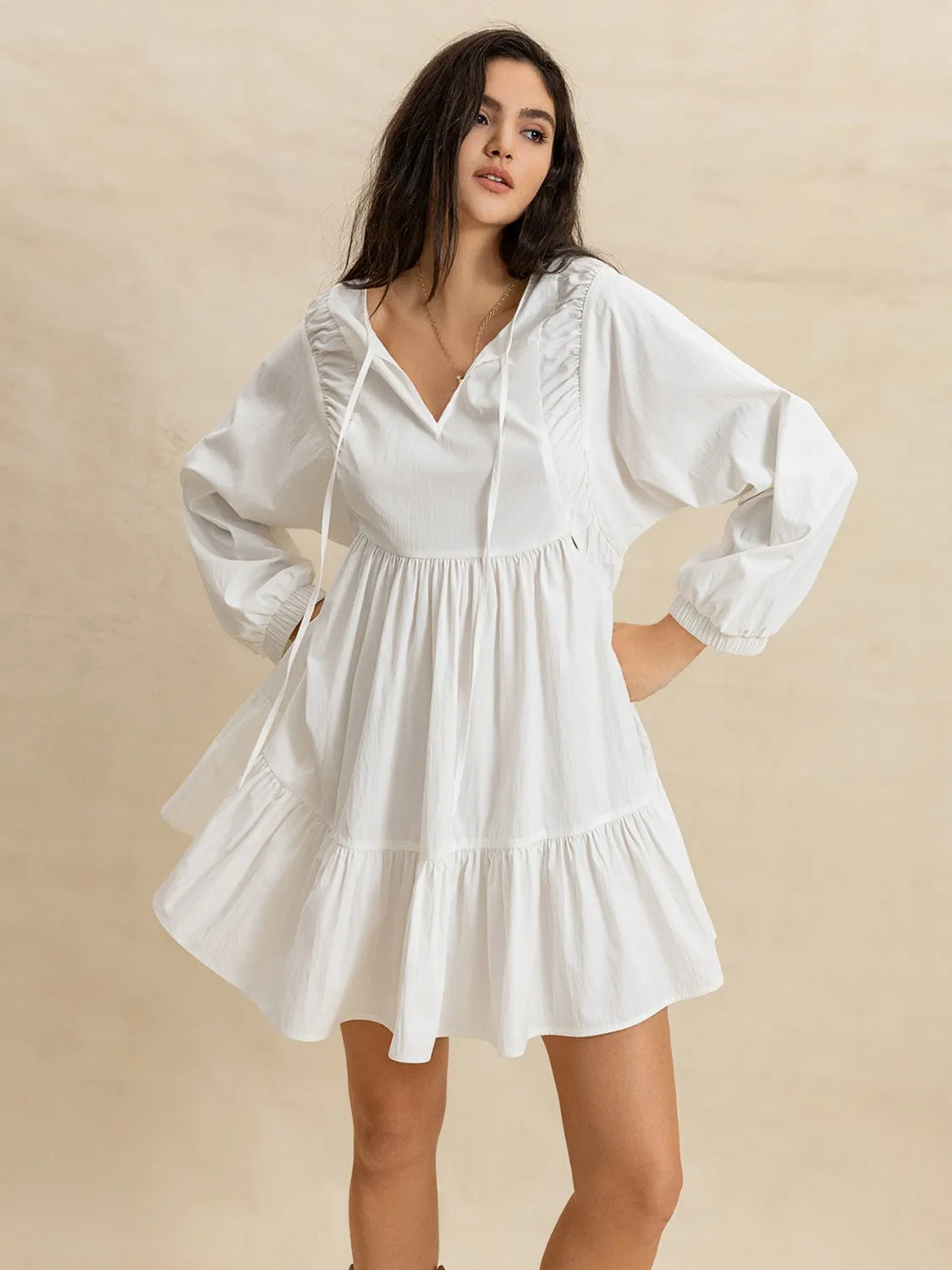 Buy Tiered Tie Neck Long Sleeve Mini Dress by Faz