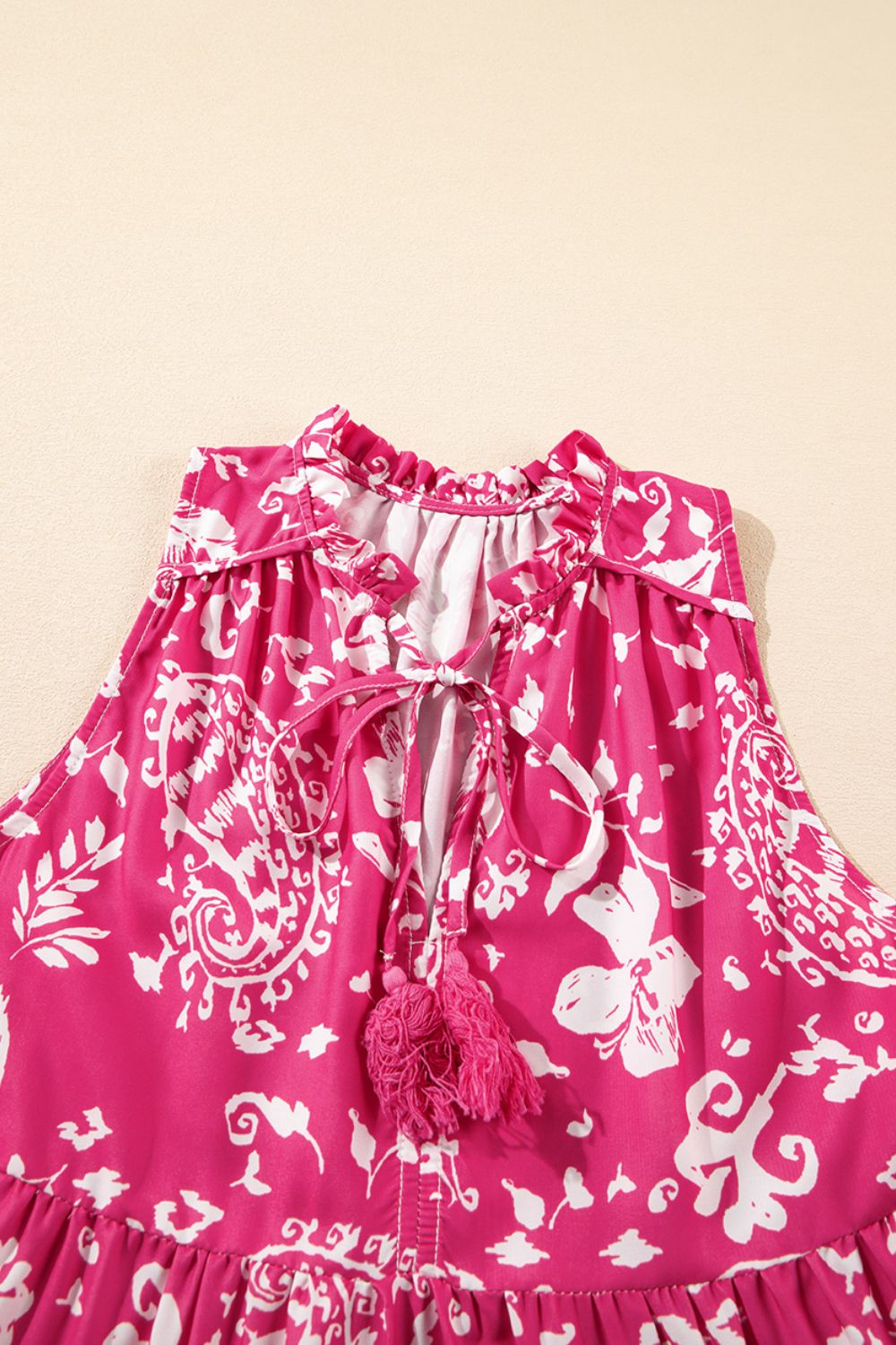 Buy Floral Sleeveless Tasseled Tie Neck Tiered Midi Dress by Faz