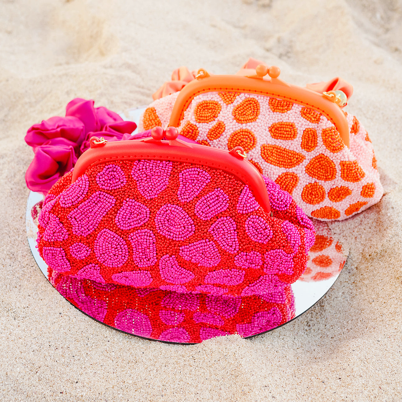 The Arnoldi Jean Hand-Beaded Clutch, in Red & Pink