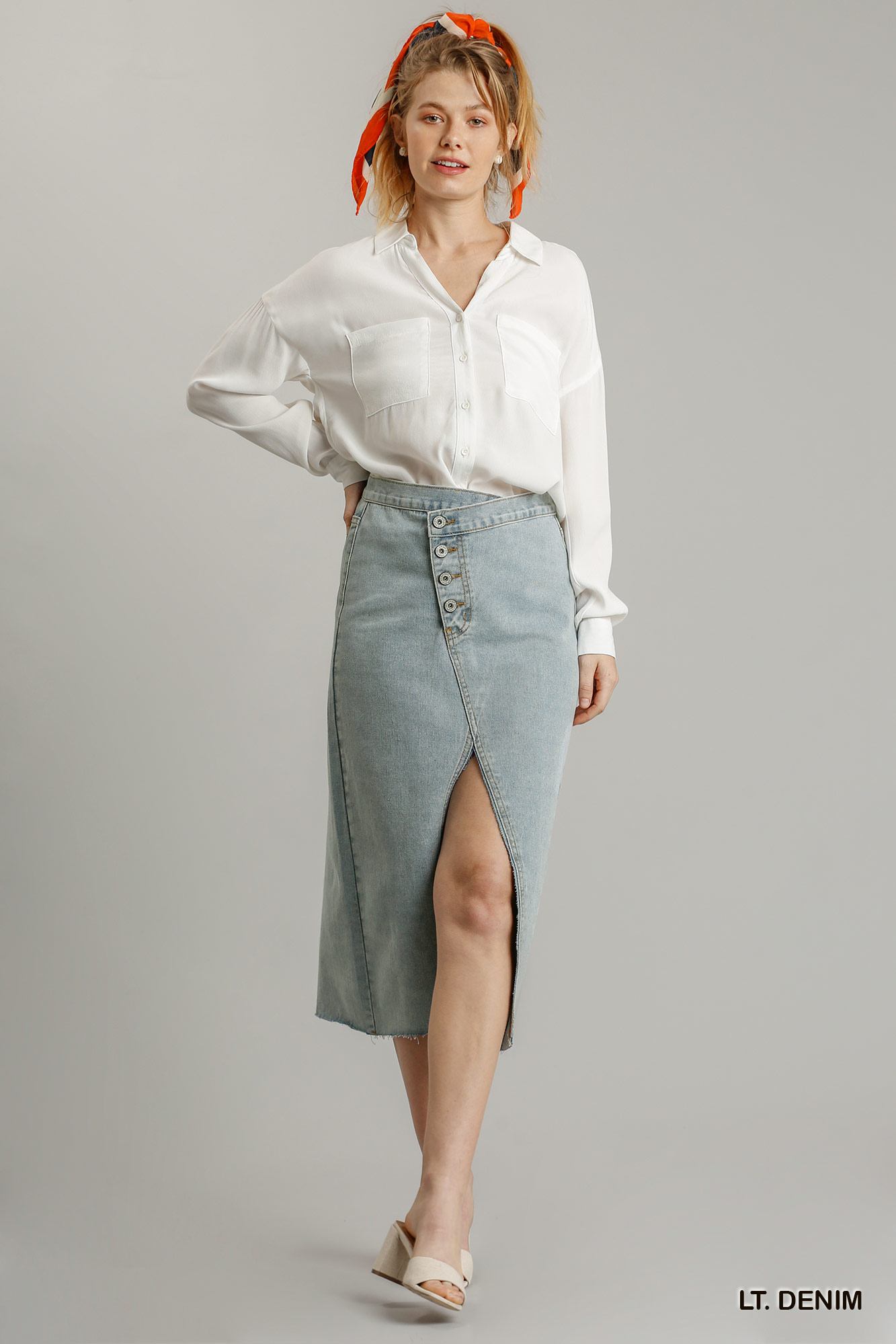 Buy Asymmetrical Waist And Button Up Front Split Denim Skirt With Back Pockets And Unfinished Hem by Balec Group