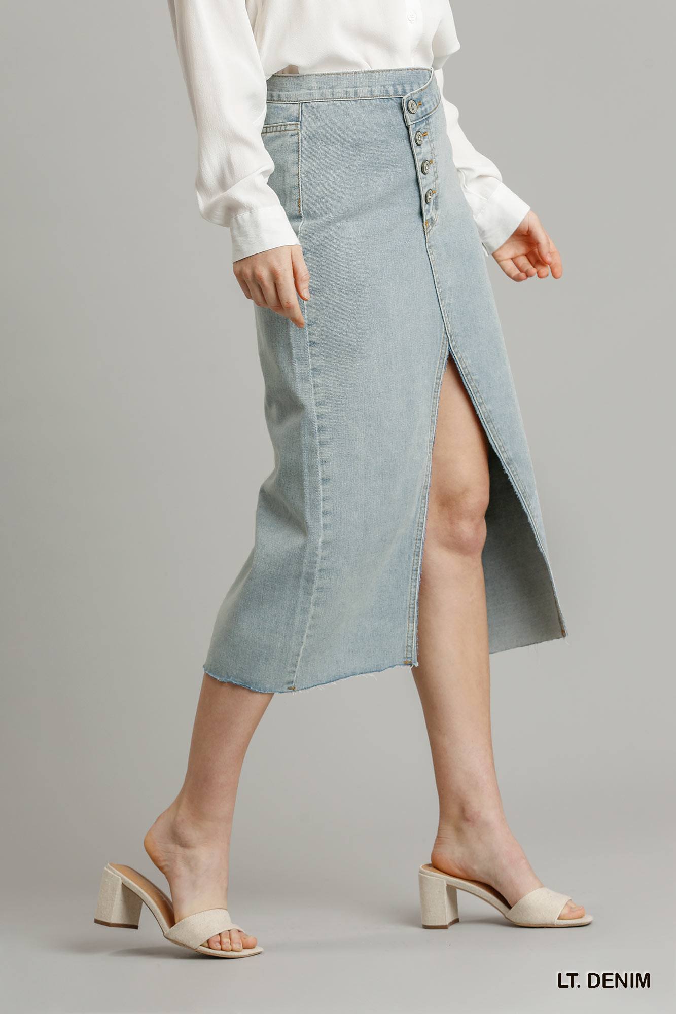 Buy Asymmetrical Waist And Button Up Front Split Denim Skirt With Back Pockets And Unfinished Hem by Balec Group