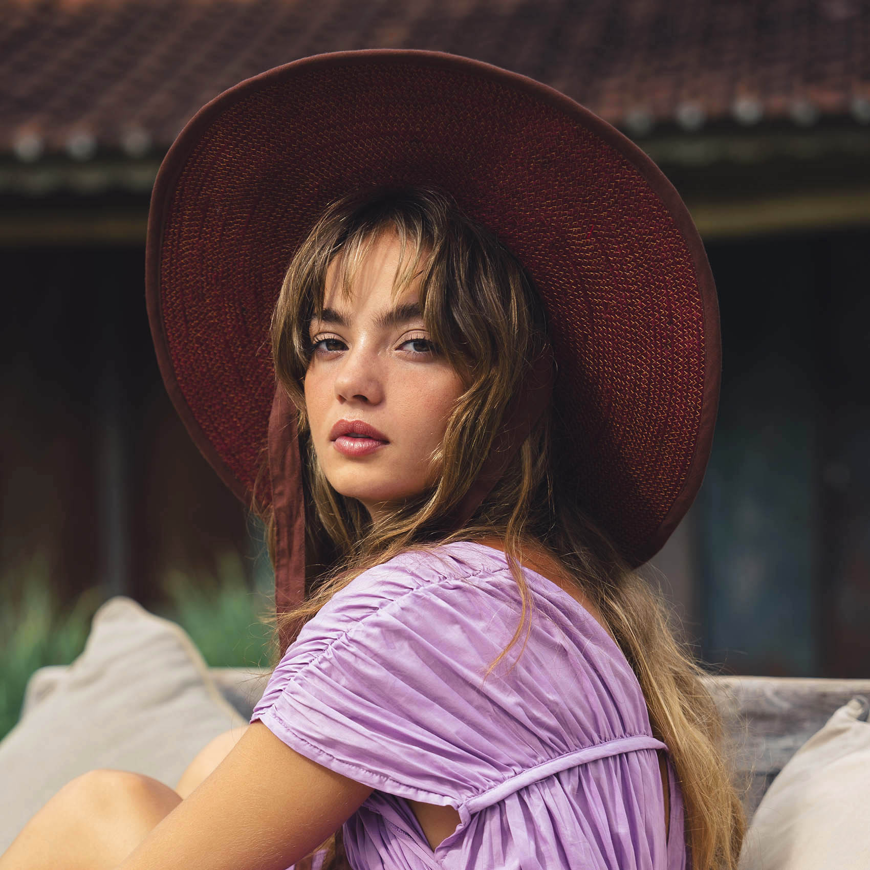 The Lolo Wide-Brim Jute Boater Hat in Burgundy