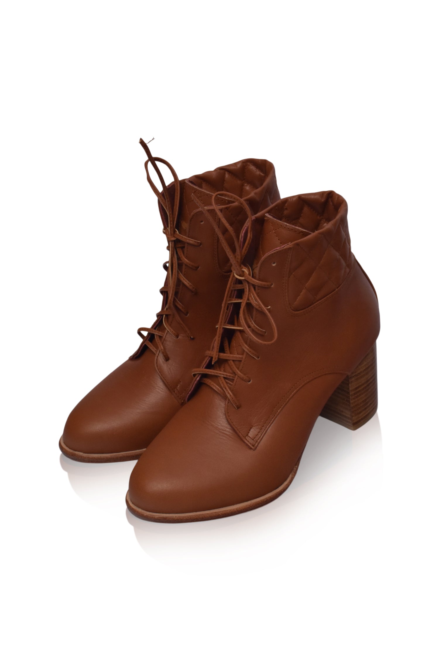 Buy Rising Mara Leather Heel Booties by Bali ELF