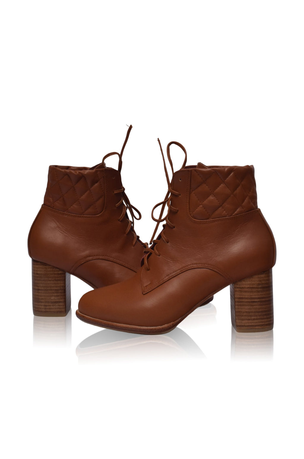 Buy Rising Mara Leather Heel Booties by Bali ELF