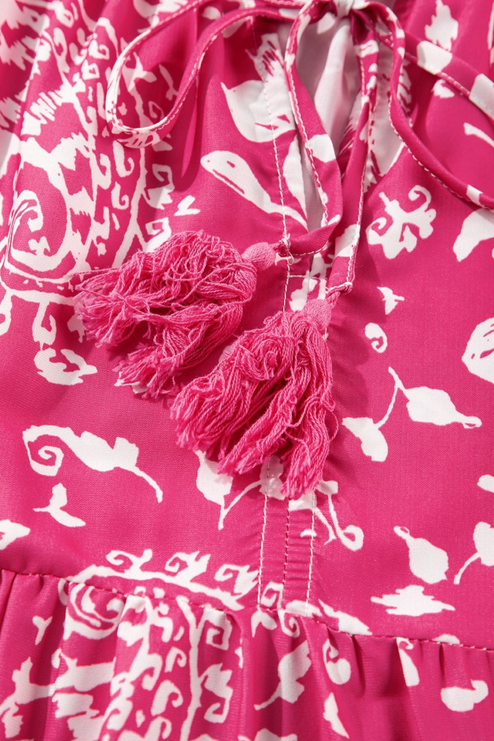 Buy Floral Sleeveless Tasseled Tie Neck Tiered Midi Dress by Faz