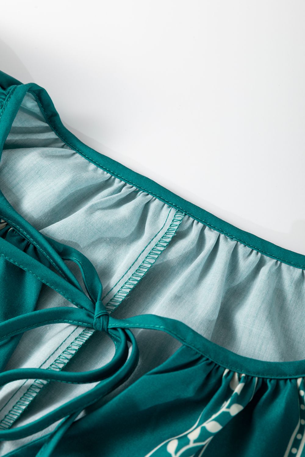 Buy Floral Ruffle Puff Sleeve Tie Neck Mini Dress by Faz