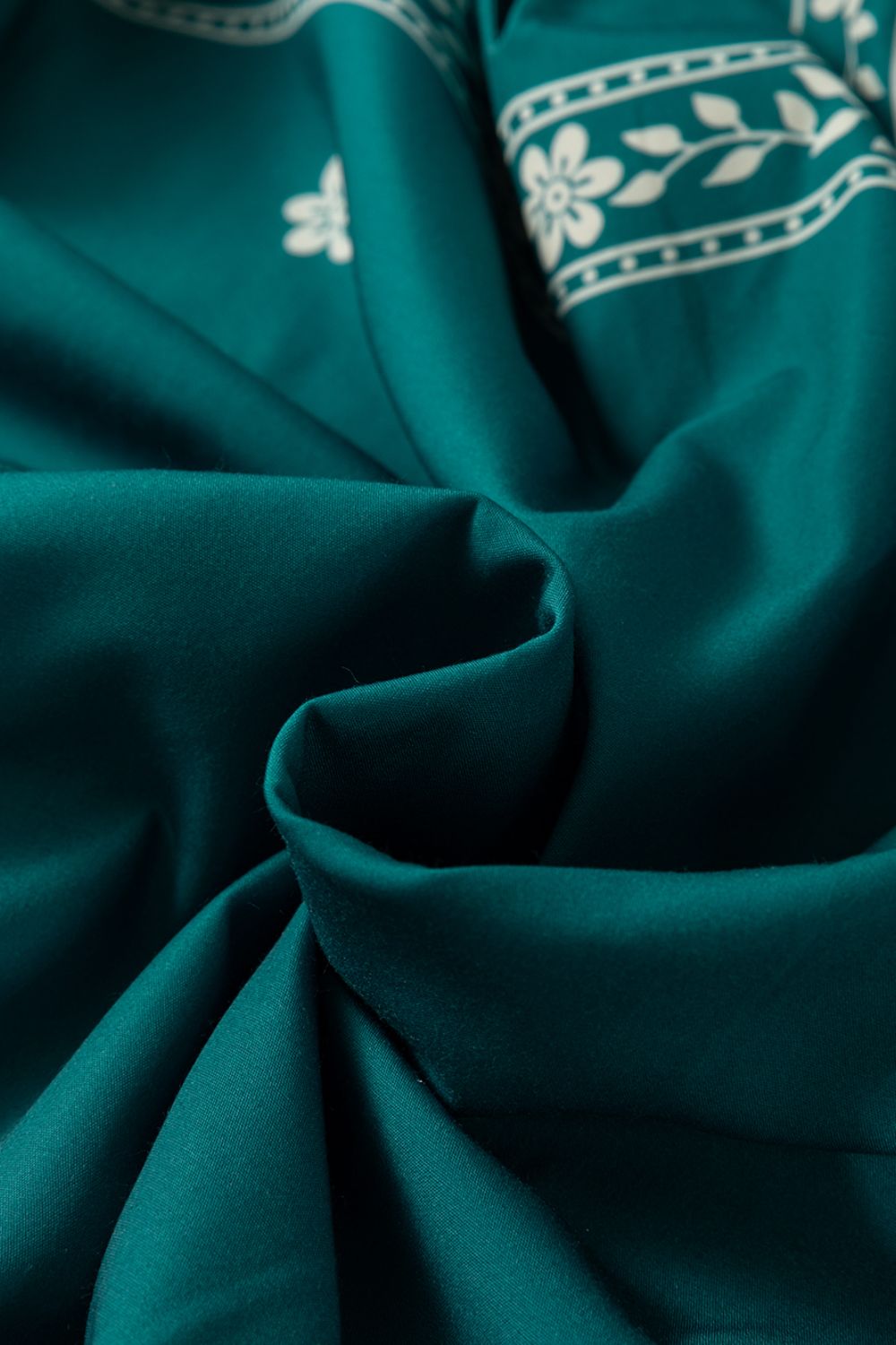 Buy Floral Ruffle Puff Sleeve Tie Neck Mini Dress by Faz