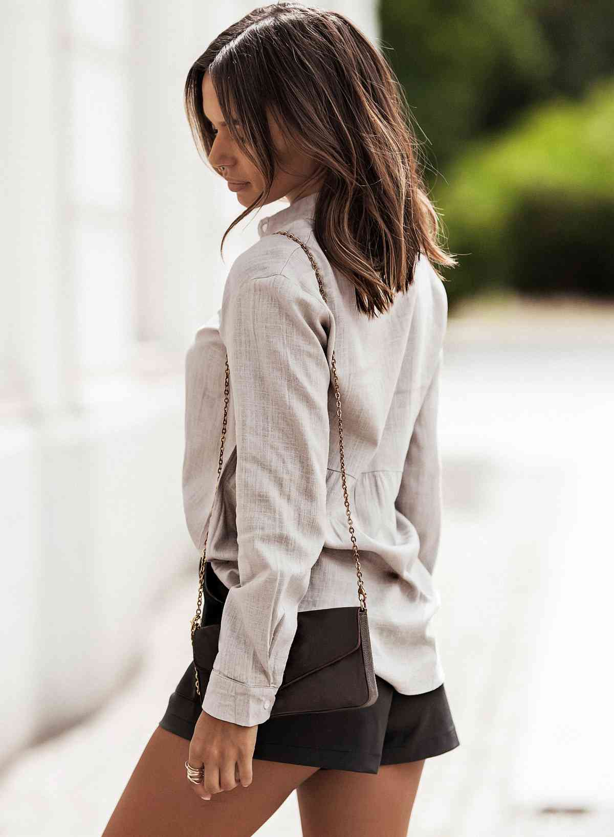Buy Textured Button Front Curved Hem Shirt by SYNZ