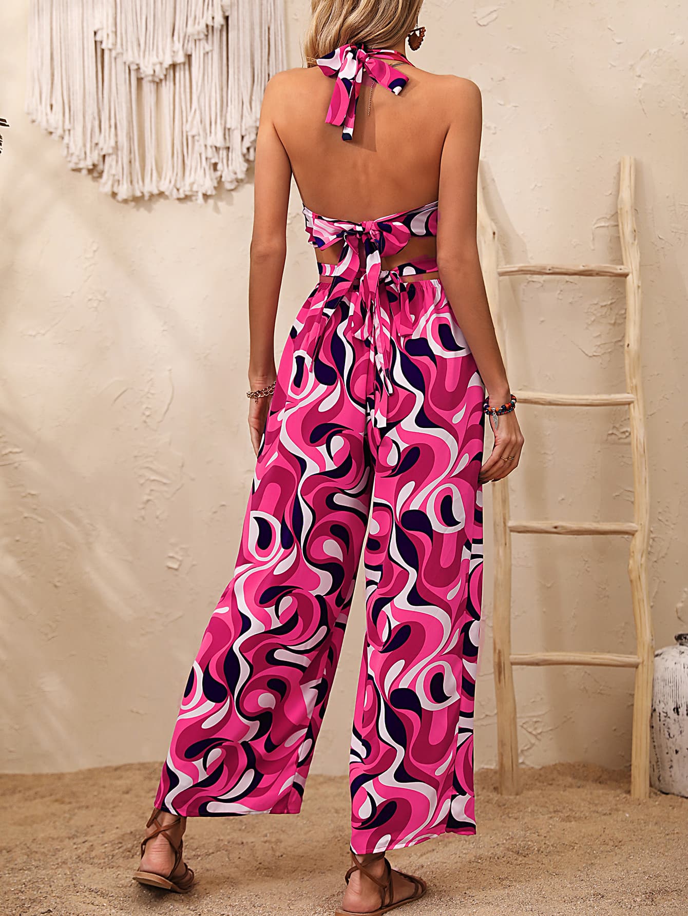 Buy Abstract Print Halter Neck Cutout Wide Leg Jumpsuit by Faz