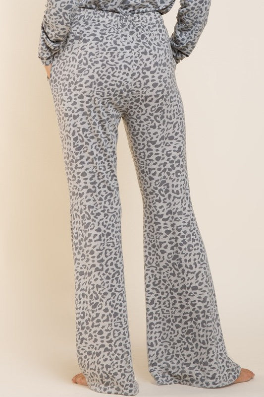 Buy POL Gray Mix Animal Print Flare Leg Pants by Sensual Fashion Boutique by Sensual Fashion Boutique
