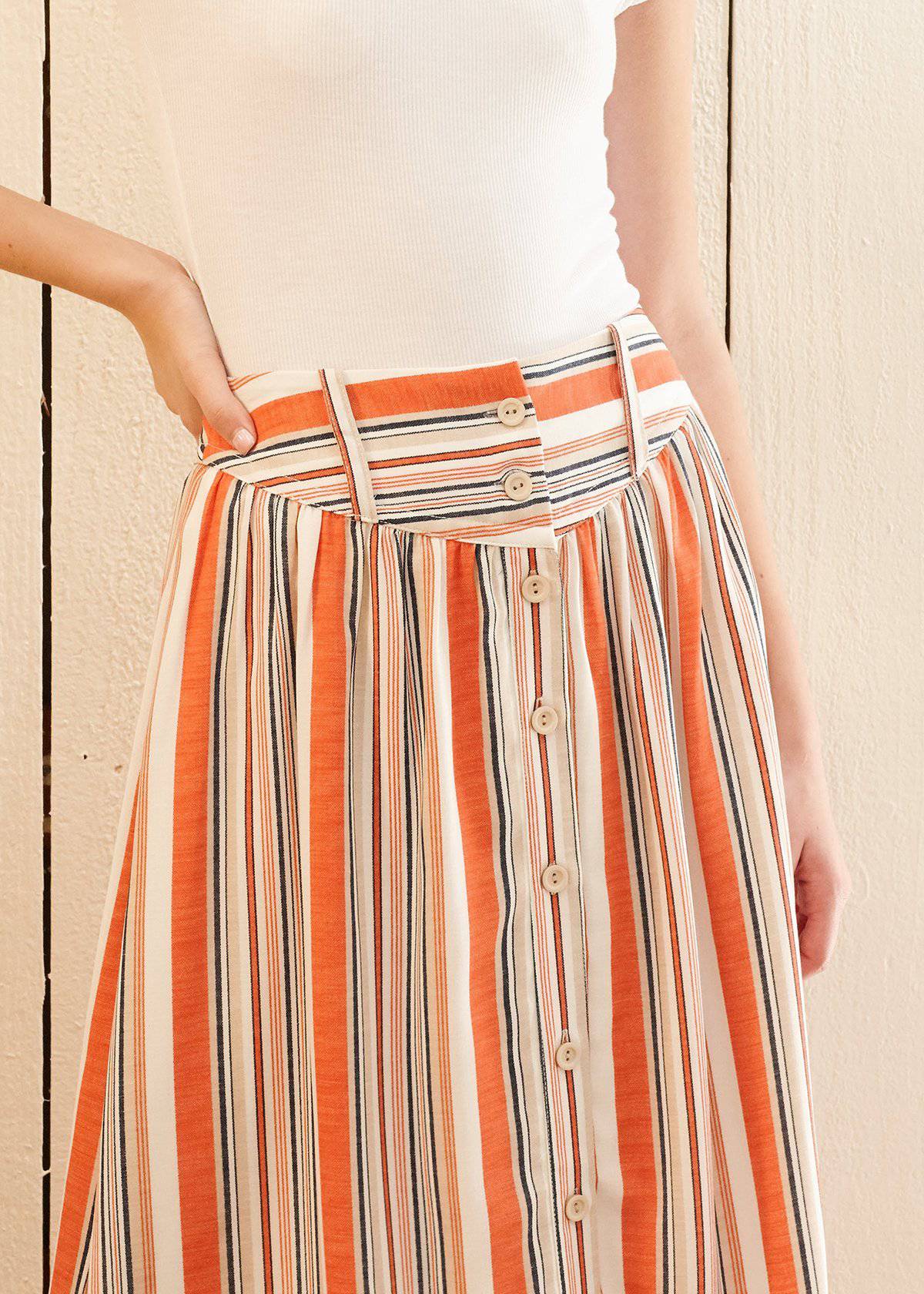 Buy Multi Stripe Button Front Midi Skirt in Rust Multi by Shop at Konus