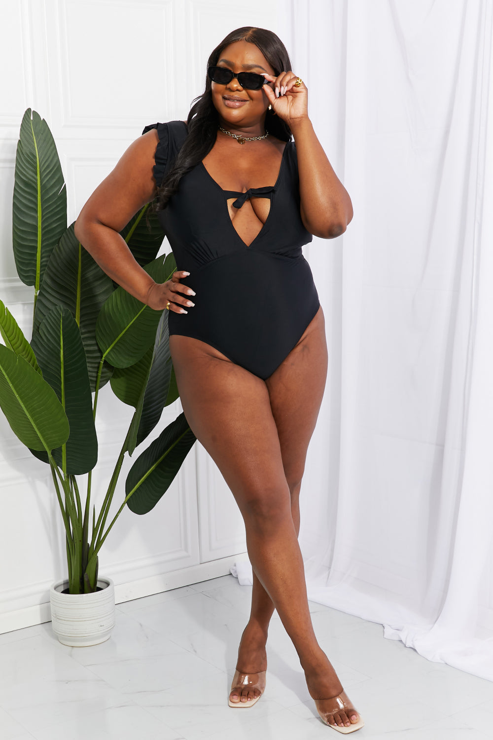 Buy Seashell Ruffle Sleeve One-Piece in Black by Marina West Swim