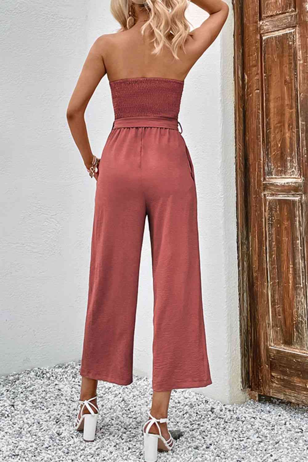 Buy Decorative Button Strapless Smocked Jumpsuit with Pockets by Hundredth