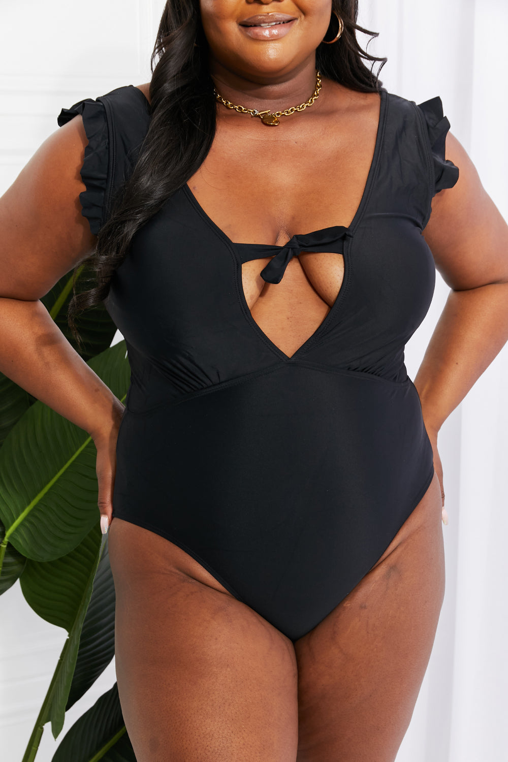 Buy Seashell Ruffle Sleeve One-Piece in Black by Marina West Swim