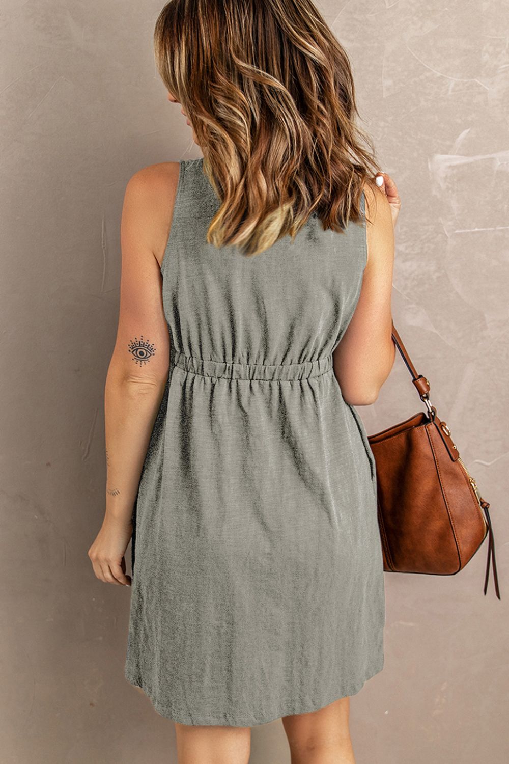 Buy Sleeveless Button Down Mini Magic Dress by SYNZ