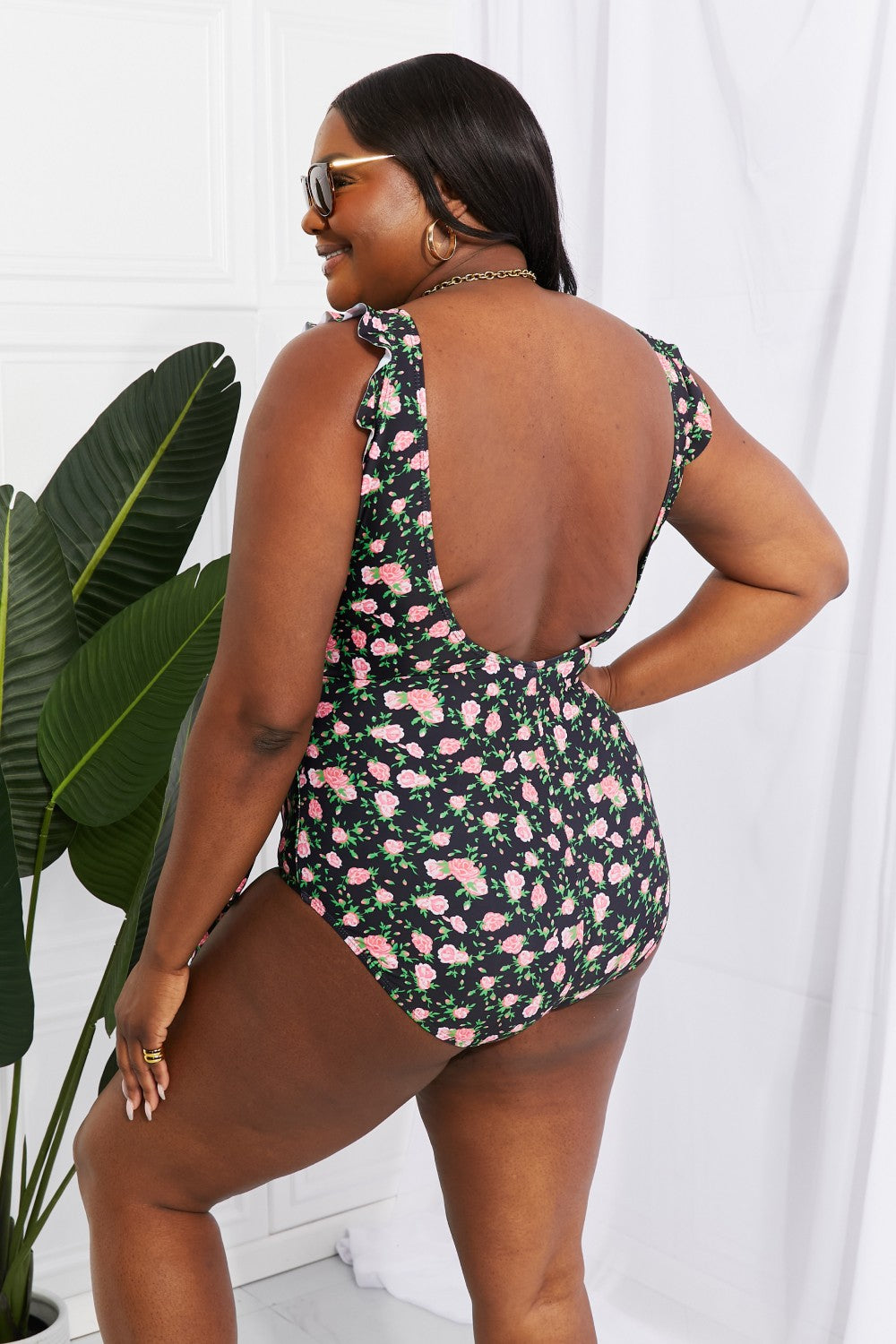 Buy Full Size Float On Ruffle Faux Wrap One-Piece in Floral by Marina West Swim